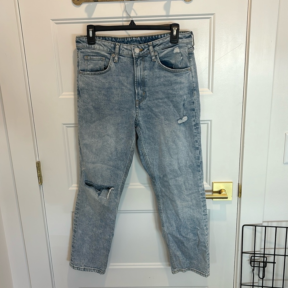 Distressed light wash jeans